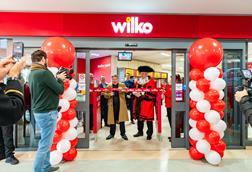 Owner Chris Dawson cutting the ribbon Wilko's Plymouth store