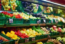 Fresh vegetables on display in supermarket