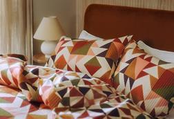 Patterned George at Asda pillows on bed