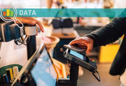 Man tapping phone on card reader