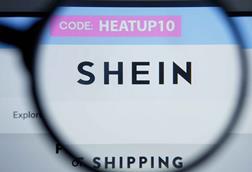 Shein website under a magnifying glass