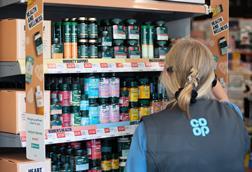 Co-op colleague organising shelves