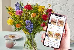 Moonpig smartphone screen and flowers