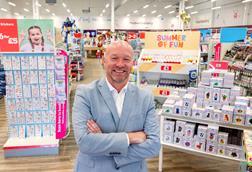 Hobbycraft boss Graeme Campbell in front of in-store display