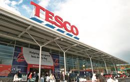 Tesco has delivered an improved performance over Christmas and unveiled the appointment of Halfords boss Matt Davies and the closure of its Cheshunt head quarters.