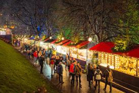 Shoppers in an outdoor Christmas market
