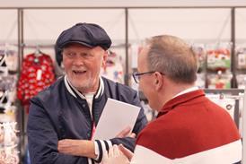 Asda chair Allan Leighton talks to a customer