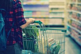 Consumer with shopping trolley