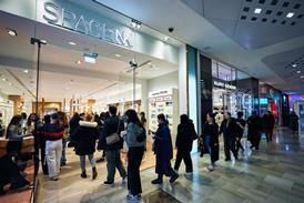 Queue of people entering Space NK's Westfield London store