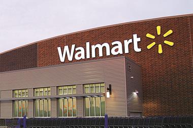 Walmart said profits will drop between 6% and 12% in its next financial year as it ploughs cash into reviving its slowing sales growth.