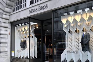 Moss Bros has hailed “further improvement” in trading performance as retail sales jumped ahead of its annual general meeting today.