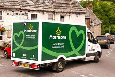 Morrisons delivery van outside a pub called The Greyhound in the UK