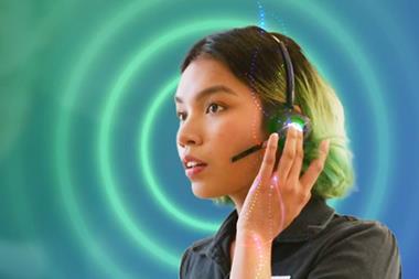 Store assistant wearing X-hoppers AI headset