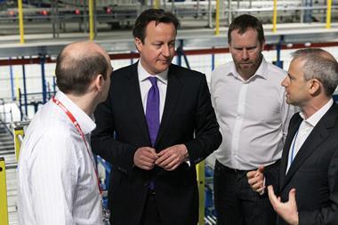 David Cameron, pictured with Ocado boss Tim Steiner, has been accused of "watering down" planned fines for supermarkets who squeeze their suppliers