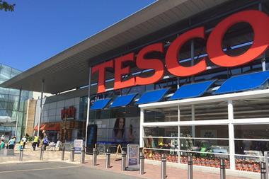 Three former Tesco executives have been accused of “cooking the books”