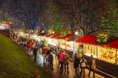 Shoppers in an outdoor Christmas market