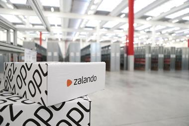 Zalando packages in foreground of warehouse