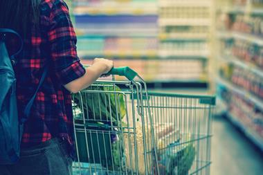 Consumer with shopping trolley