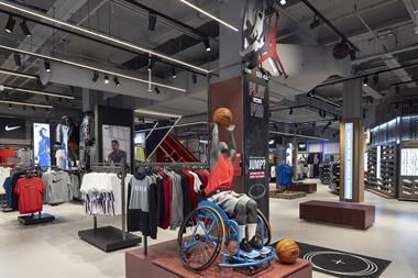 Mannequin of wheelchair basketball player and Jordan t-shirts at Sports Direct, Oxford Street