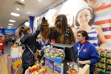 Chewbacca mans the tills in store.