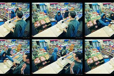 Man attacking a shop worker in a store