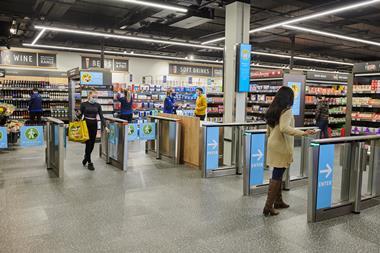 Aldi ShopandGo store with customers entering and leaving the shop