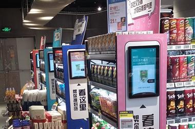 Screens with product information that can be called up via a product's QR/barcode are at the end of some of the ambient food aisles