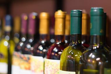Close-up on a shelf of wine bottles
