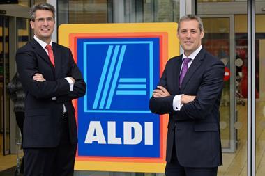 Aldi bosses Roman Heini (left) and Matthew Barnes claim the grocery price war has played into their hands