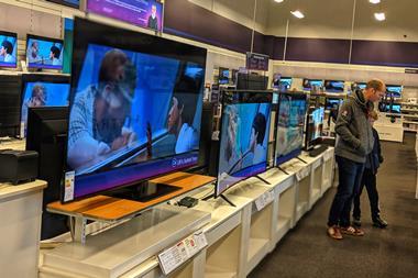 TVs on display in electricals store