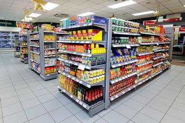 Essential groceries like condiments, cooking sauces, rice and canned goods fill the shelves at the first Morrisons Daily store, in Crewe.
