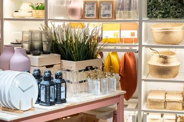 Products on display in Ikea Hammersmith store including plants, clocks and vases