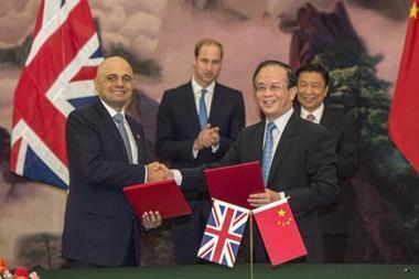 Savid Javid signing the UK-China cultural exchange agreement in Beijing