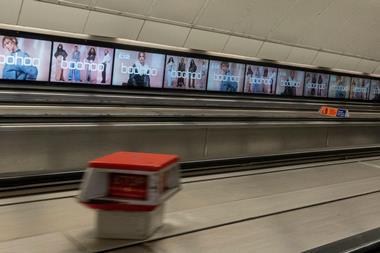 Boohoo adverts on tube escaltor