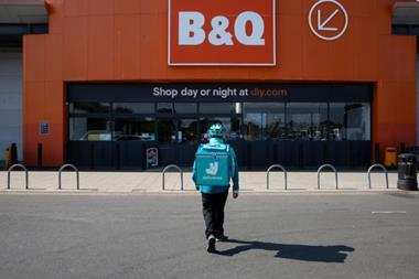 Deliveroo driver outside a B&Q store