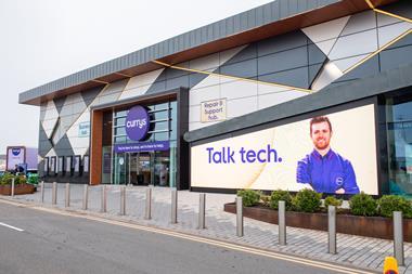 Exterior of Currys store in retail park