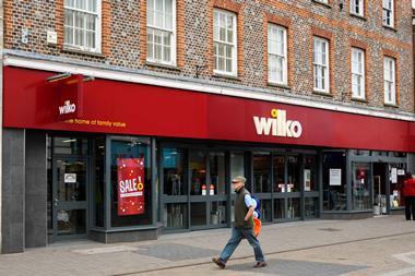 Exterior of Wilko store with person walking past