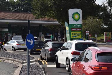 Cars queueing outside petrol station September 2021