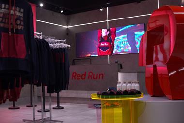 Interior of Red Run store, Liverpool One, showing a screen and products on display