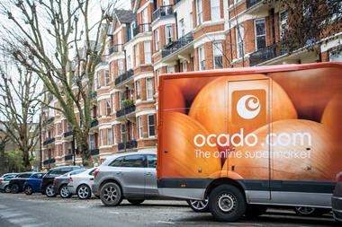 Ocado-branded van on a residential street