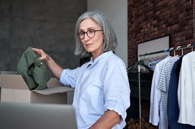 Older woman working in fashion store