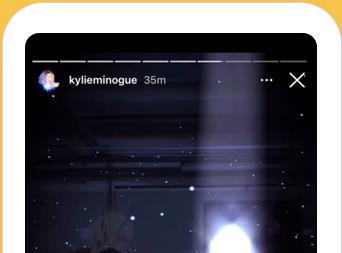 Phone showing blurred image of a woman for Kylie Minogue's Disco album campaign