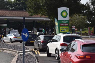 Cars queueing outside petrol station September 2021