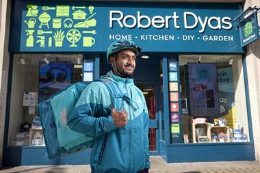 Deliveroo rider outside Robert Dyas store