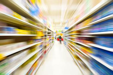 Blurred supermarket shelves