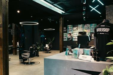 Interior of Gymshark Deload store showing barbershop