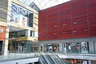 Exterior of Next department store in Atria Watford, shown from within the centre