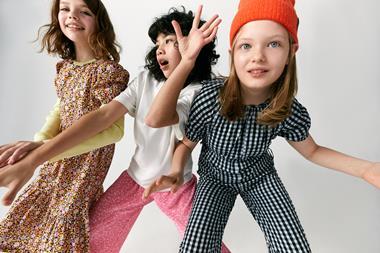 Three girls modelling John Lewis fashion range for tweens