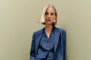 Female model wearing Marks & Spencer suit