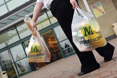 Pressure is mounting on Morrisons to alter its food labelling to adopt the traffic light system but the grocer has called for greater consistency across its rivals first